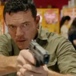 weekend in taipei luke evans mit waffe im anschlag